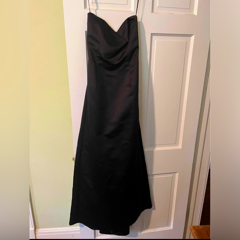 Gorgeous strapless black evening gown.
